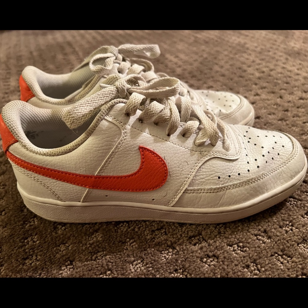 Nike Women's White Leather Sneakers with Orange Swoosh